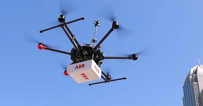 Tactical drone operator using secure communications equipment for autonomous unmanned systems.
