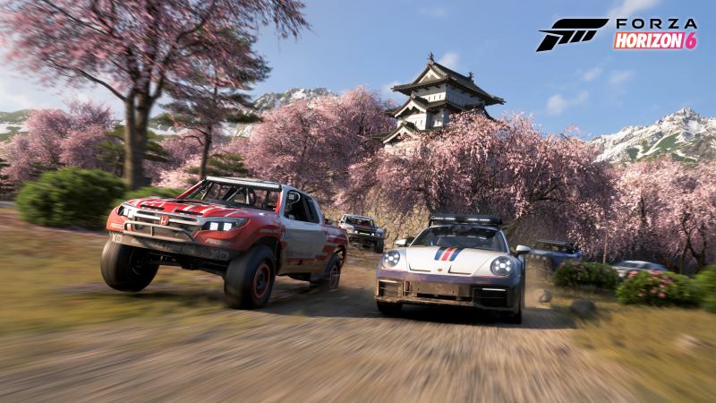 Forza Horizon 6 promotional image featuring cars near Hirosaki Castle in Japan.