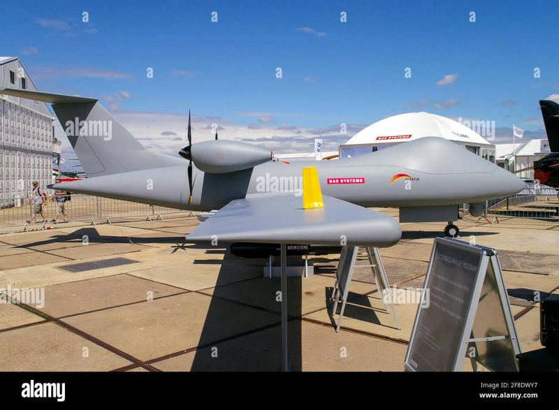 Military drone aircraft displayed at an aerospace defense event