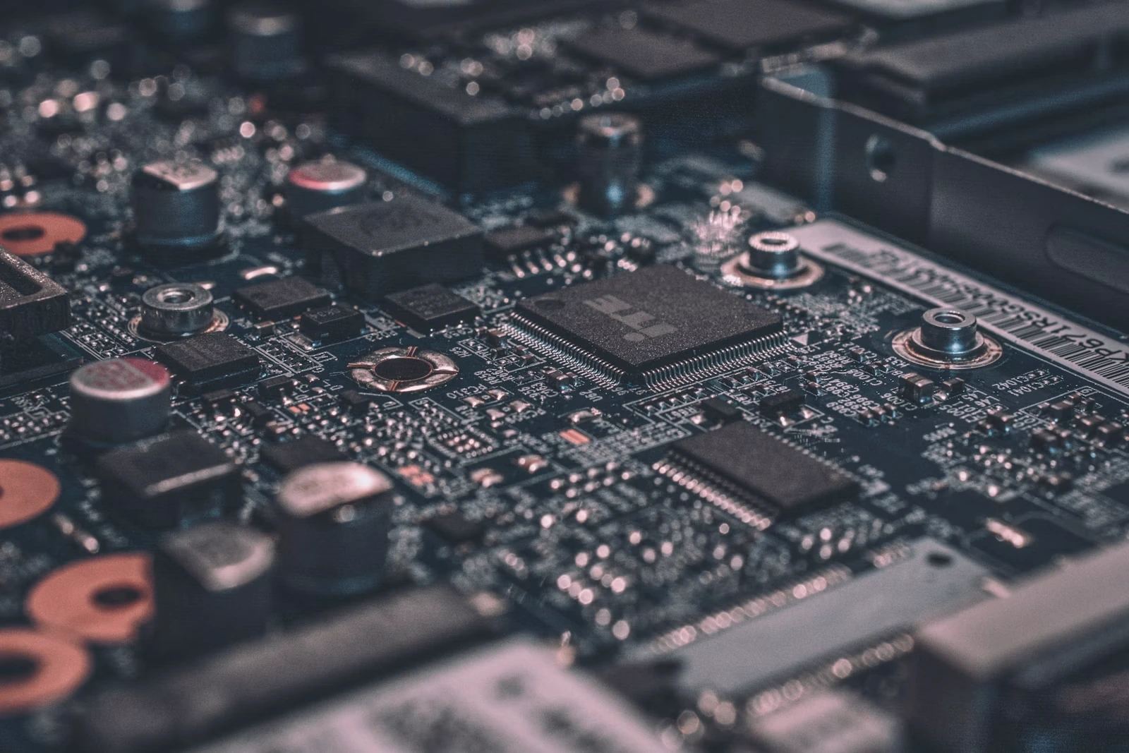 Close-up of a semiconductor circuit board representing AI accelerator infrastructure