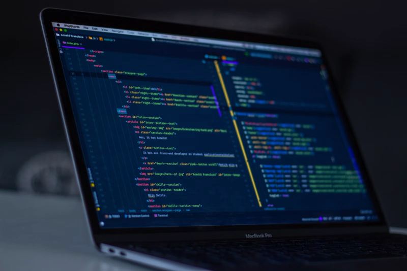 Developer workstation showing software code and automation tools