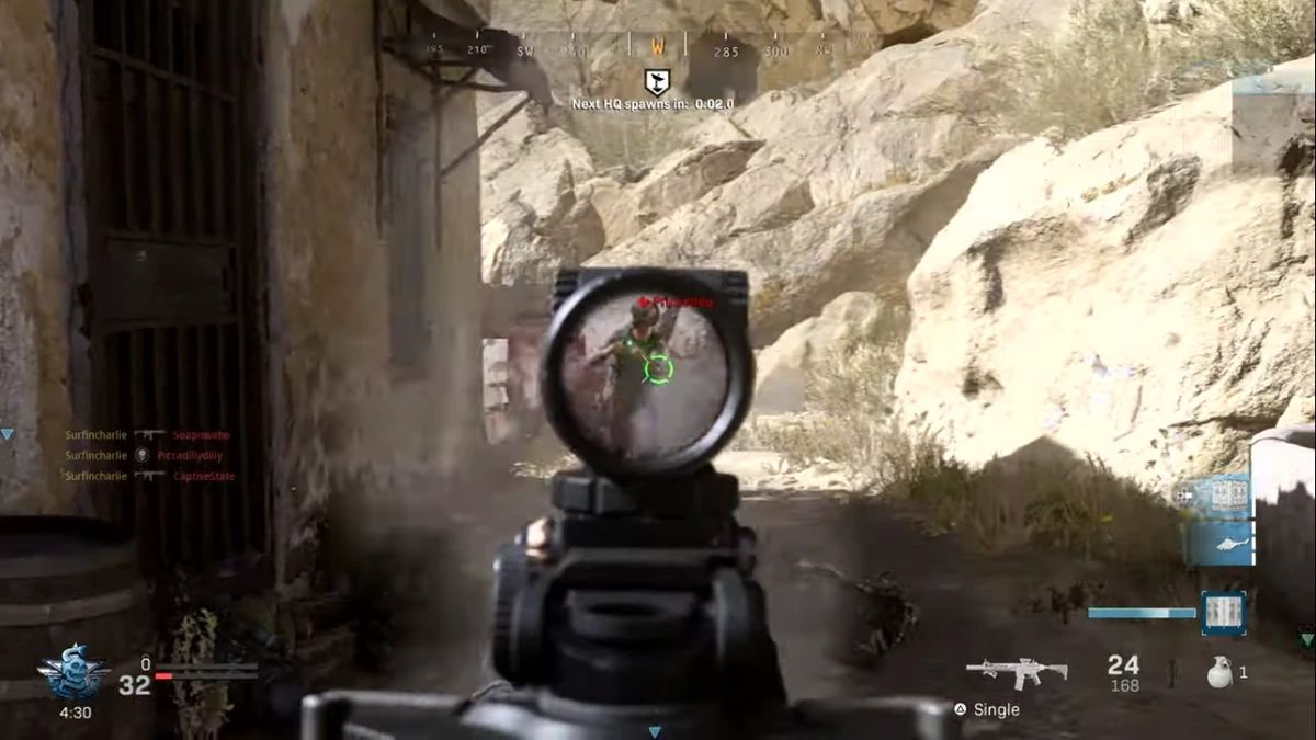 First-person shooter multiplayer gameplay scene with tactical movement and a heads-up display.