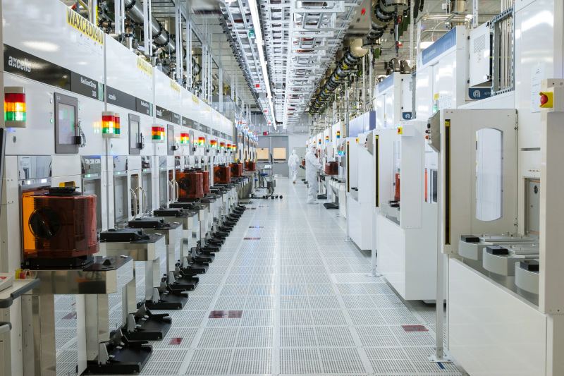 Automated semiconductor fabrication equipment in a cleanroom.