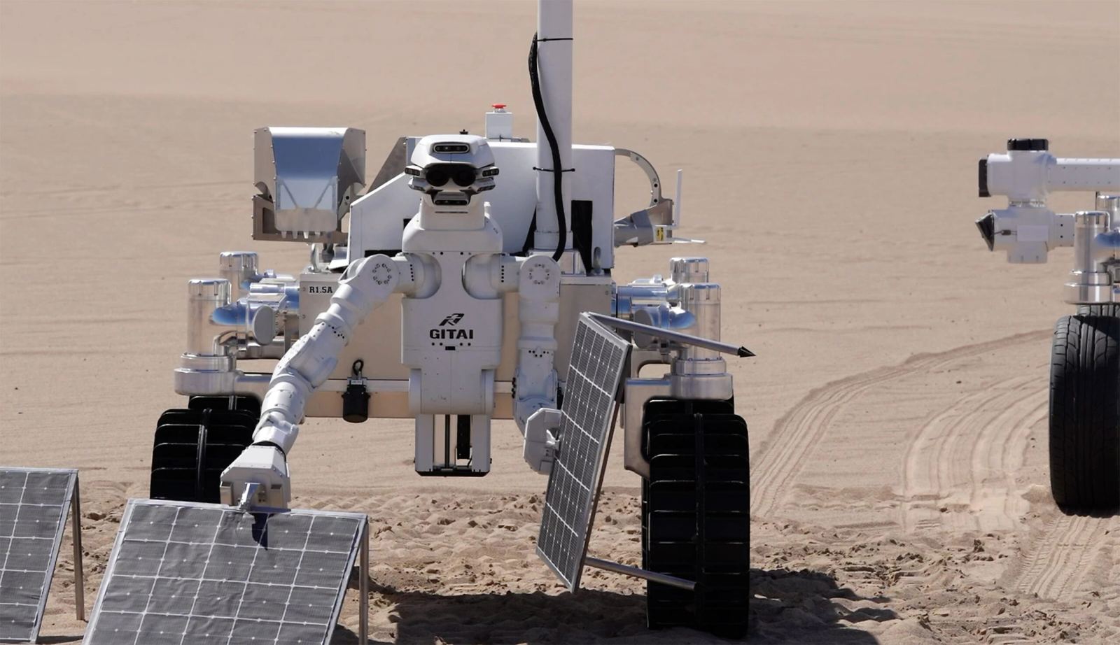 Gritt robotic arms and spatial AI working on a utility-scale solar construction site.