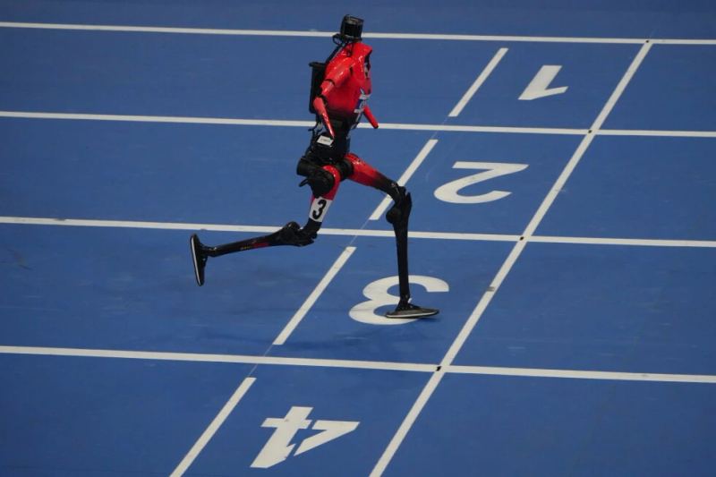 Humanoid robot racing in Beijing at the World Humanoid Robot Games
