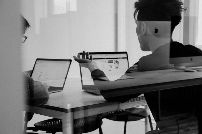 Team working around a software architecture dashboard