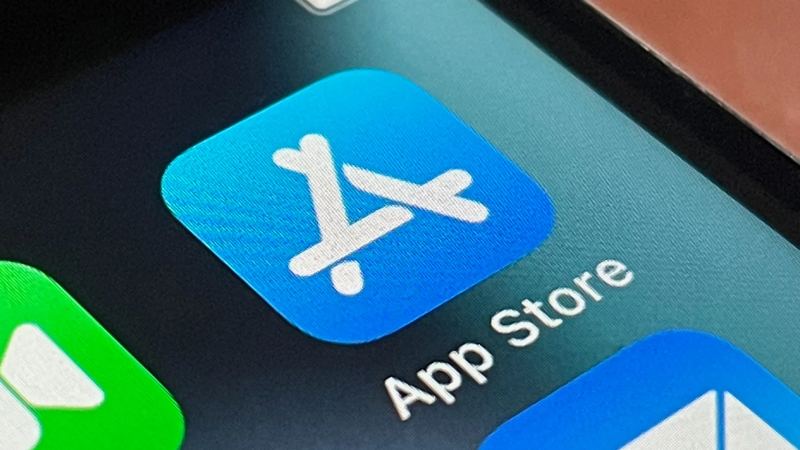 Smartphone displaying iOS App Store interface illustrating digital software distribution