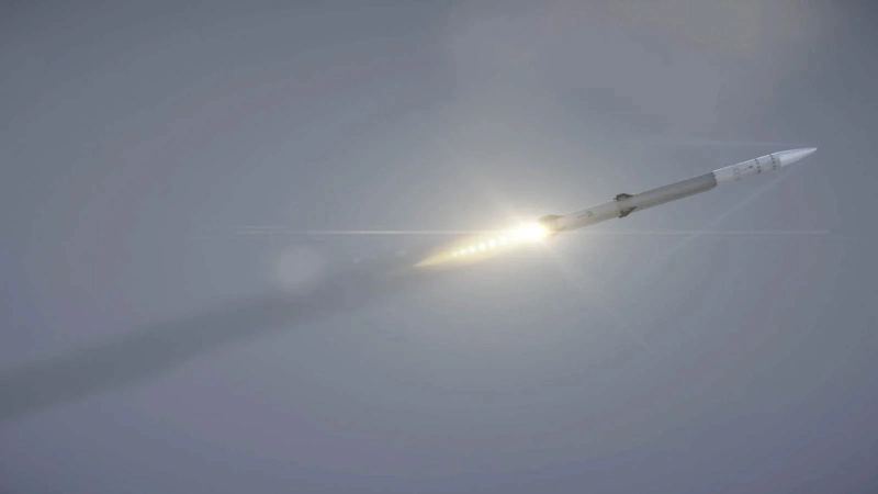 Boeing-Anduril mid-range air defense interceptor missile model showing aerodynamic surfaces and guidance optics.