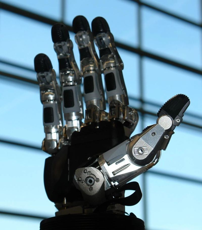 Fully articulated five-finger anthropomorphic robotic hand showcasing multi-joint servo actuation and mechanical tendons