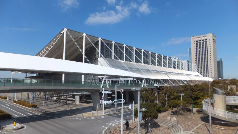 Sprawling exhibition hall interior at Makuhari Messe convention center hosting major gaming and interactive technology expos