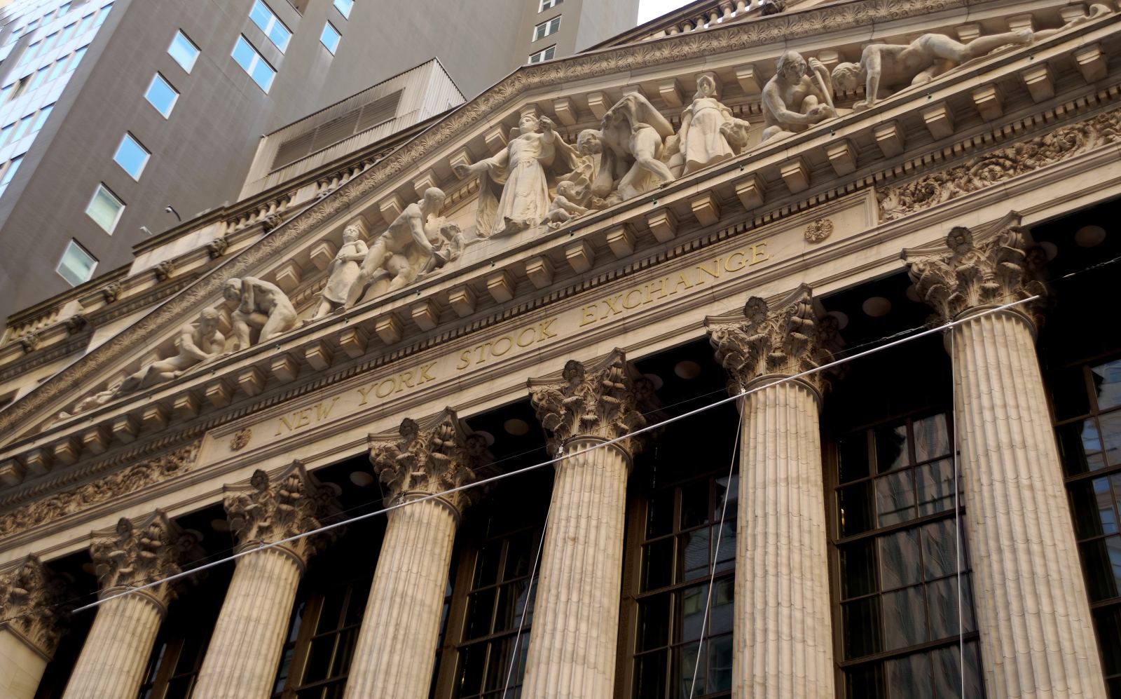 The architectural facade of the New York Stock Exchange building on Broad Street in Lower Manhattan