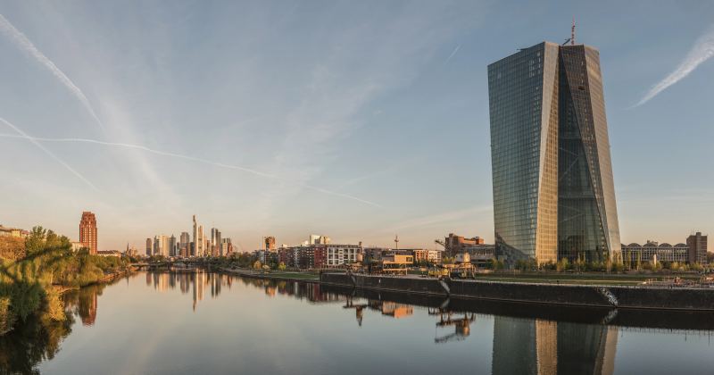 Panoramic dawn view of the European Central Bank headquarters building overlooking the Frankfurt financial skyline
