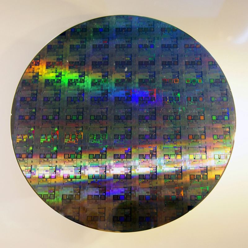A completed twelve-inch 300mm silicon wafer manufactured for automotive mixed-signal and power management semiconductors