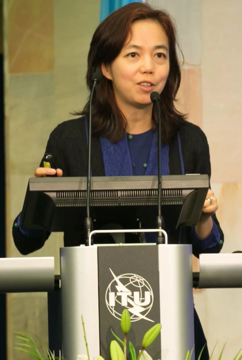 Computer scientist Dr. Fei-Fei Li delivering keynote remarks on computer vision, spatial intelligence, and 3D world models