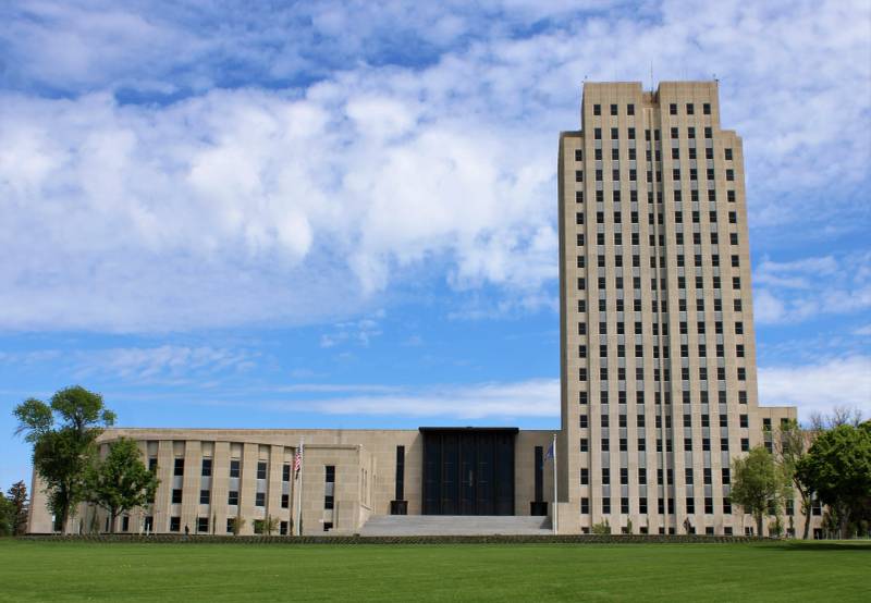 North Dakota State Capitol building in Bismarck representing the public banking jurisdiction of the state