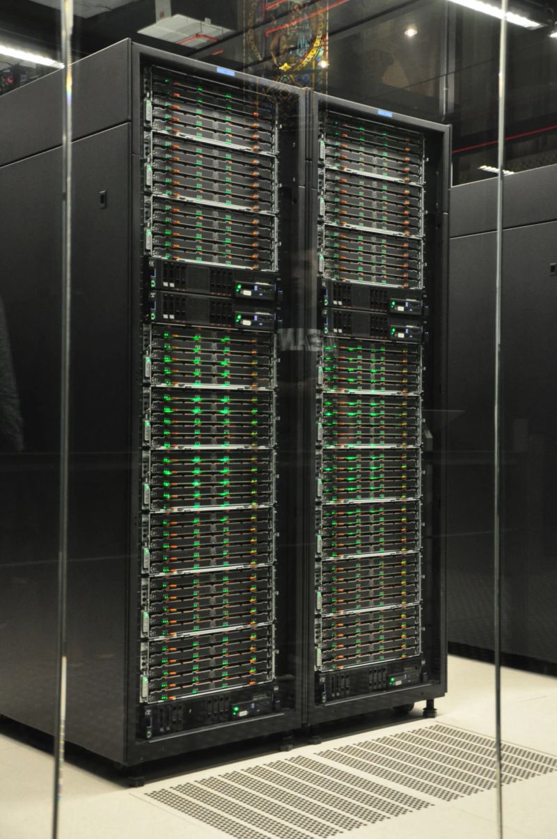 High-density enterprise supercomputing rack cabinets housing parallel hardware accelerators