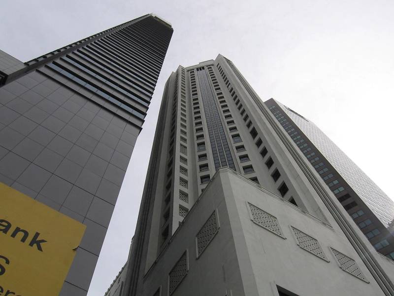 Commercial banking corporate skyscrapers representing global institutional clearing and enterprise treasury scale