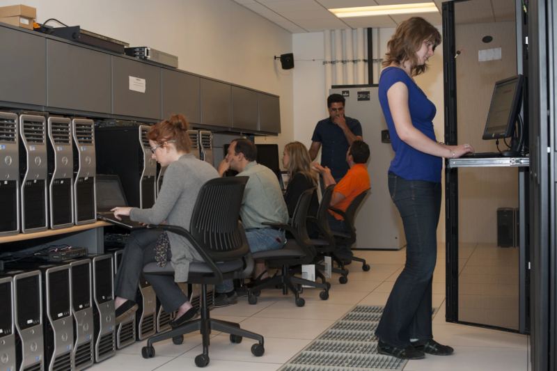 High-density supercomputing cluster racks deployed in an enterprise data center for foundation model pretraining