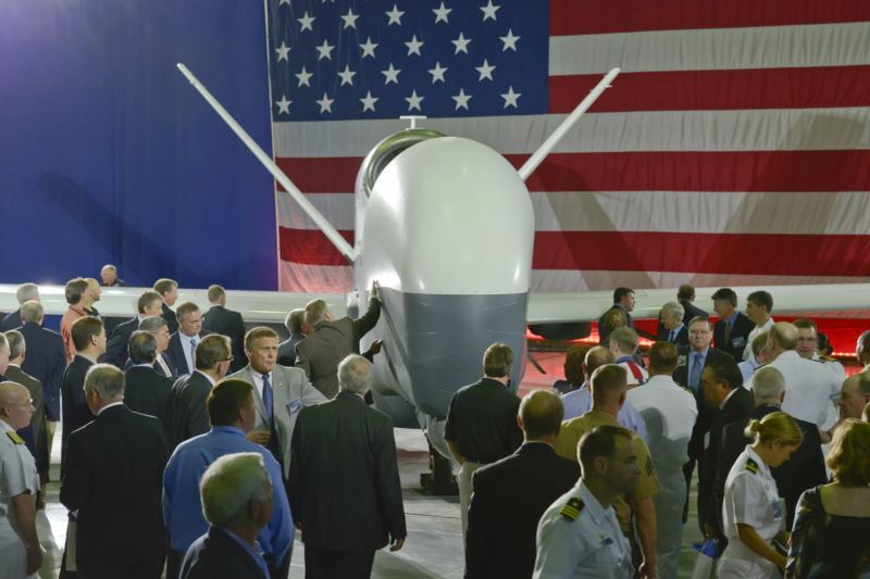 Unmanned aerial vehicle manufacturing and rollout ceremony displaying advanced military autonomous airframe design