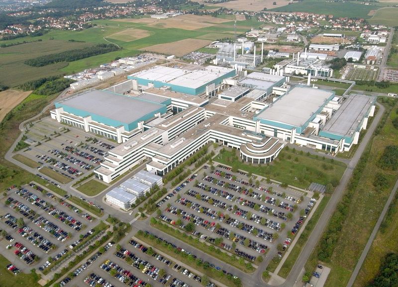 Aerial perspective of GlobalFoundries semiconductor fabrication facility complex.