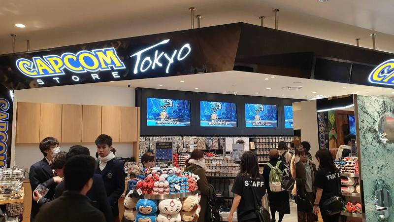 Official Capcom Store in Tokyo showcasing major game franchise merchandise, publishing history, and player community releases.