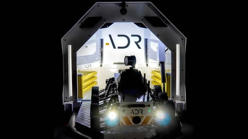 Official field photograph of the Explora mining robot operating in a hazardous underground environment.