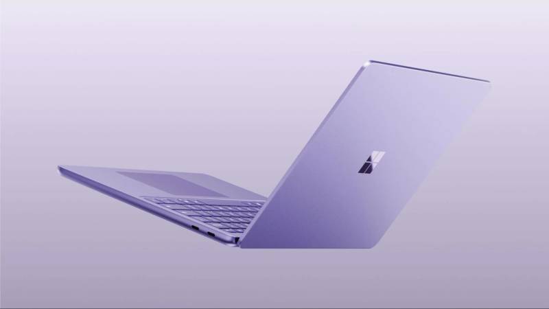 Official angled view of the actual second-edition violet 13-inch Surface Laptop.