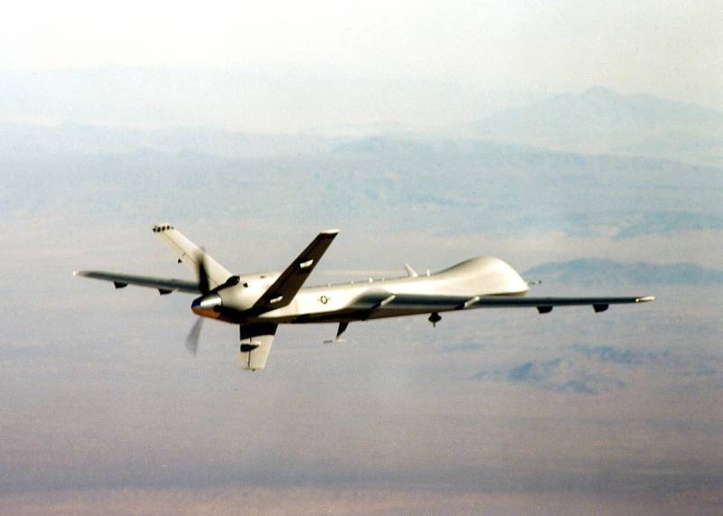 Tactical military unmanned aerial vehicle in flight across open airspace.