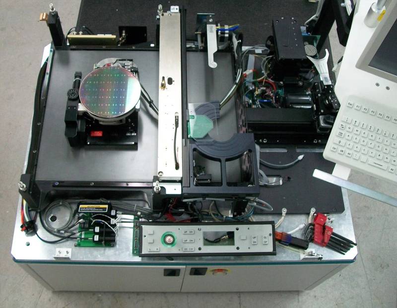 Automated semiconductor cleanroom wafer prober inspection equipment used in advanced chip fabrication testing.