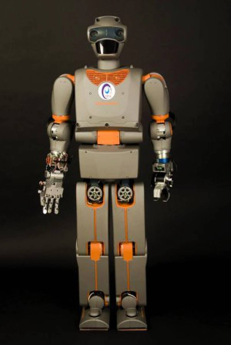 Full-scale bipedal humanoid robot hardware undergoing embodied intelligence perception calibration in laboratory conditions.