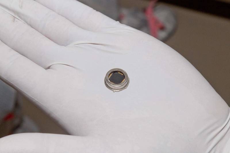Precision semiconductor silicon die microchip representing high-density integrated circuit manufacturing and advanced lithography packaging.