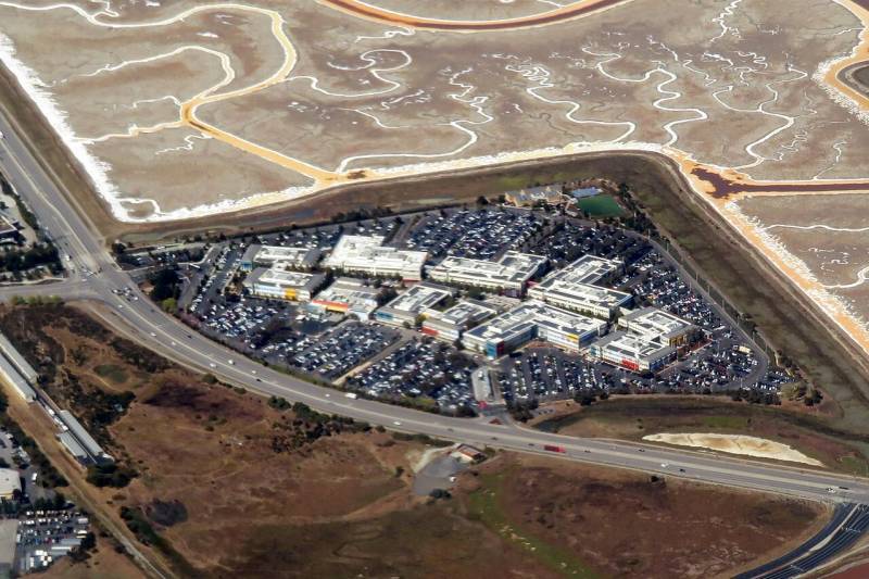 Aerial view of Meta corporate headquarters campus in Menlo Park, home to Meta Superintelligence Labs and frontier AI research infrastructure.